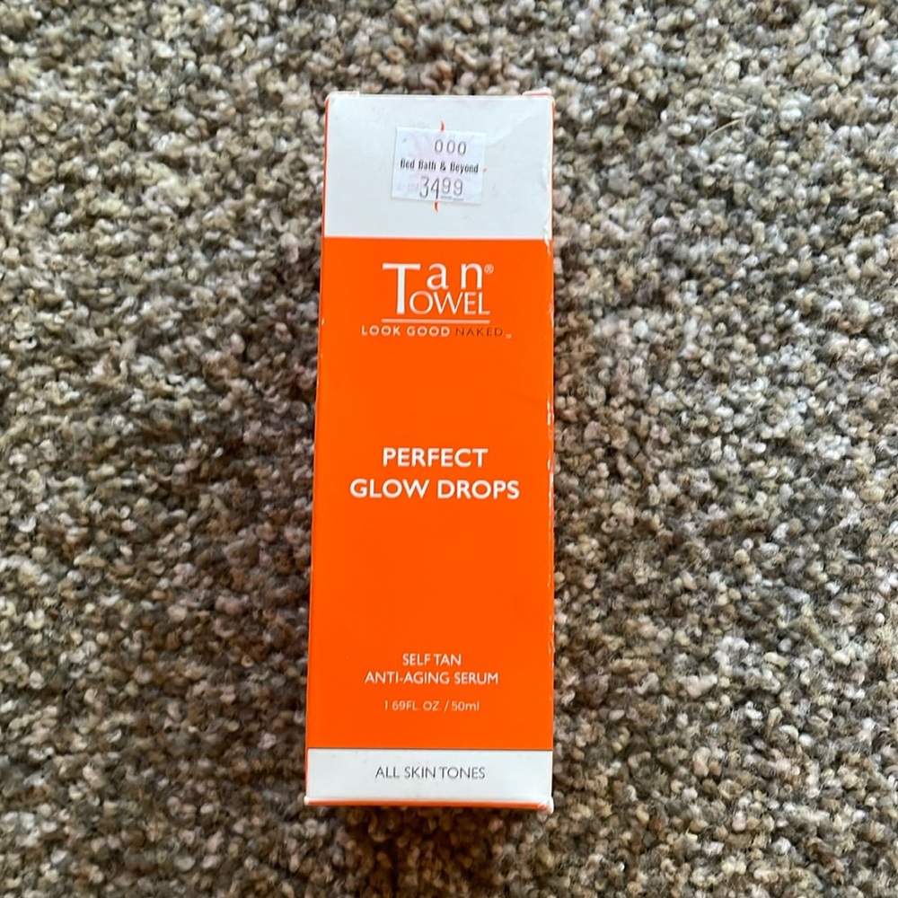 Tan towel perfect glow drops. Brand new, never used.